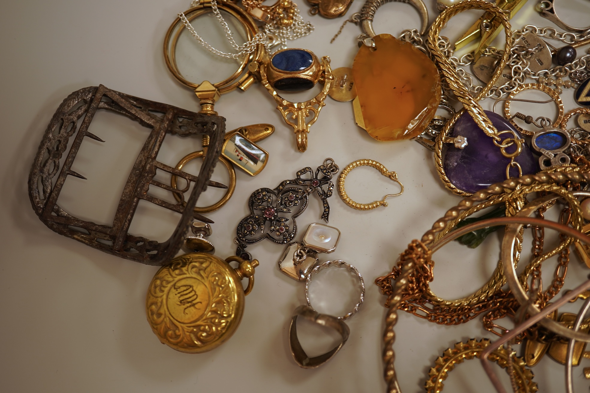 A small collection of assorted costume jewellery and other items including a cut steel shoe buckle, bracelets, chains, pair of silver and enamel oval cufflinks, etc.